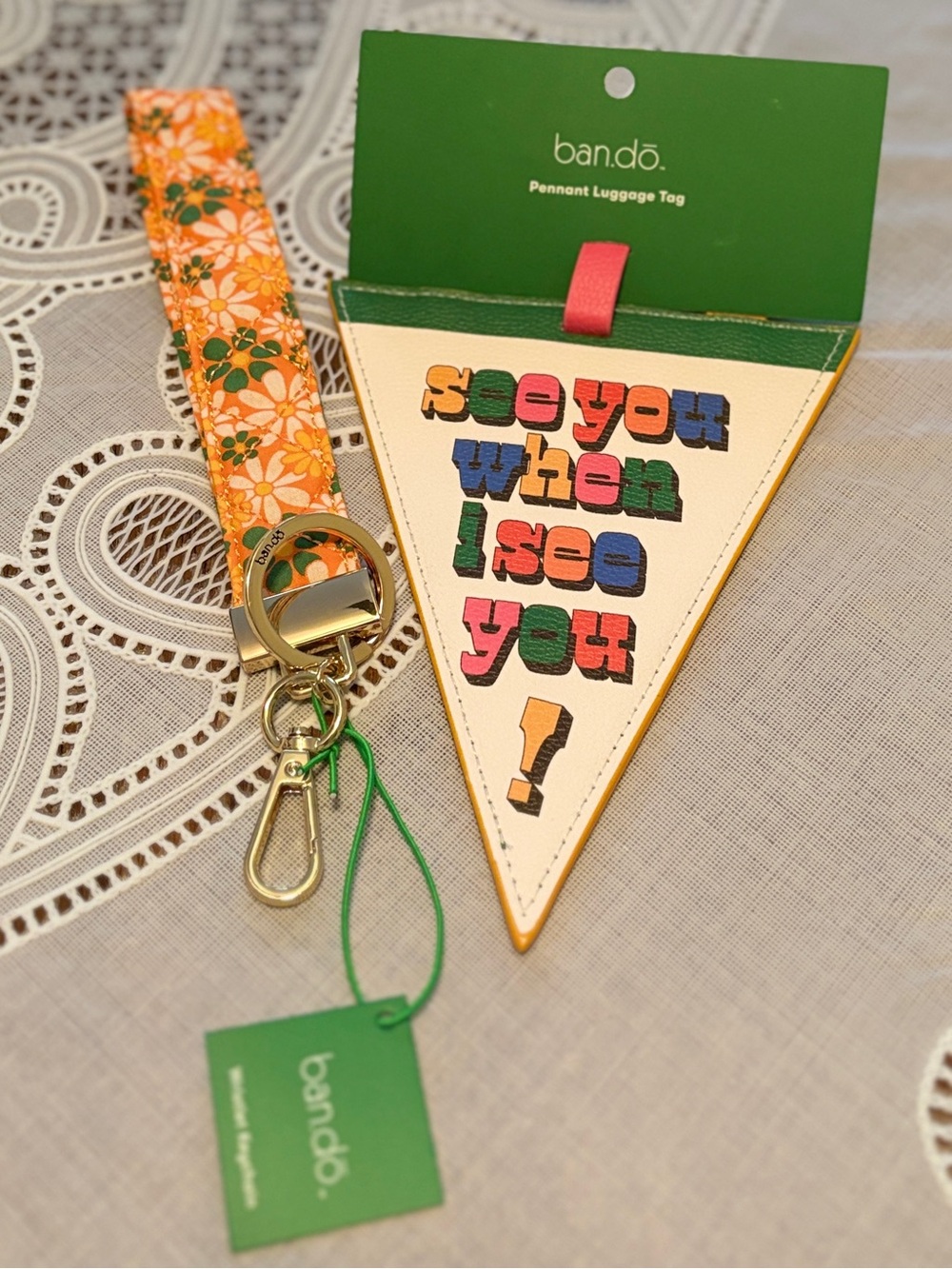 ban.do Orange Floral Lanyard with Pennant Luggage Tag